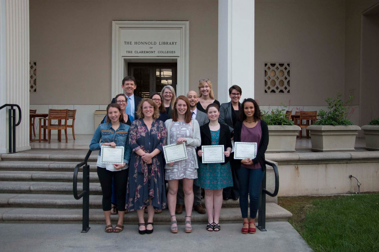 The winners of the 2017 Library Undergraduate Research Award stand with the Dean of the Library and their faculty sponsors.