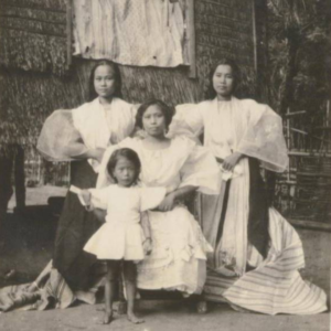 Full size image depicting three women and a child in the Philippines 